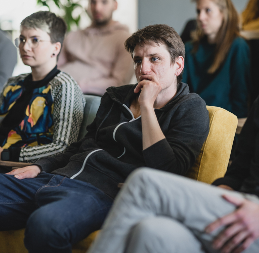 People sitting and listening to the lecture